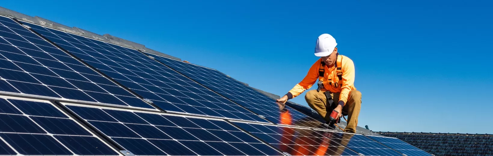 Rooftop solar worker